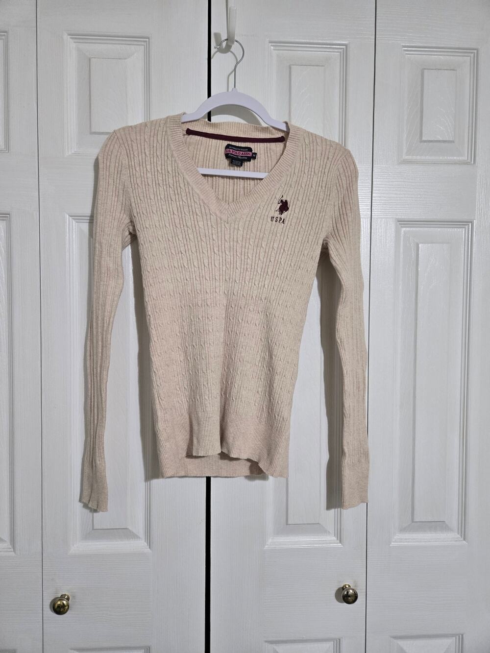 U.S. polo assn. Medium juniors cream colored knit sweater